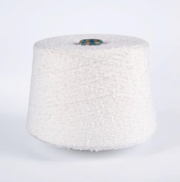 Hva er materialinnovasjonene og bearbeidingsfordelene med slitesterkt fancy garn?